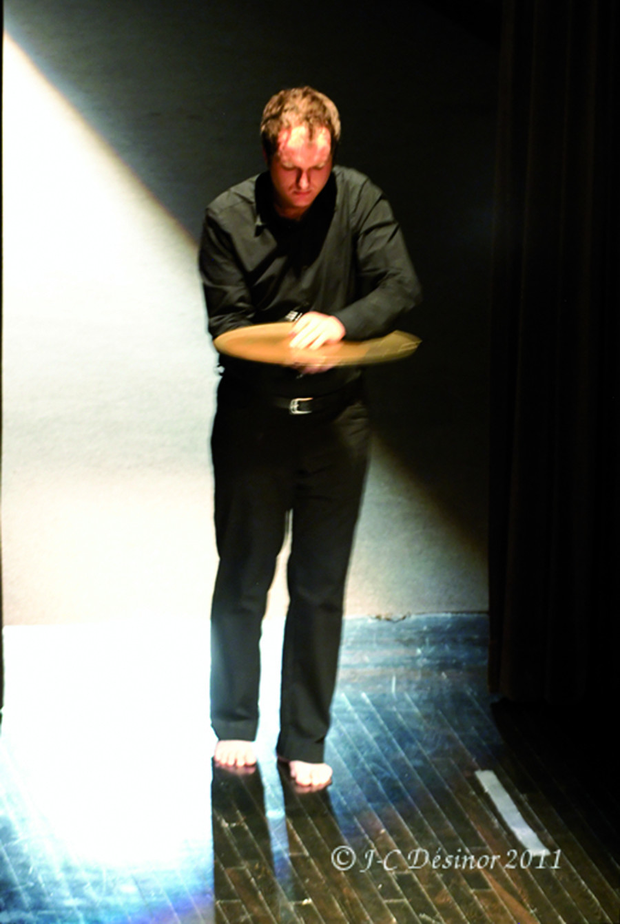 Isaiah Ceccarelli performing the piece Un artiste de la vie first part of the project À la rencontre de Kafka [Photo: Jean-Claude Désinor, Montréal (Québec), April 1, 2011]