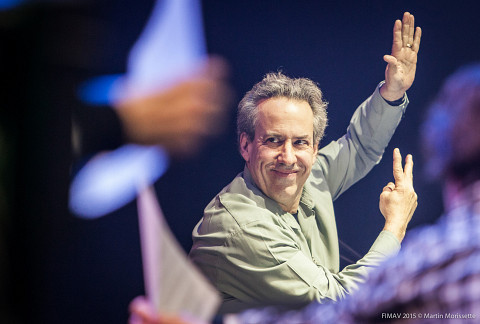 Jean Derome conducting during a concert at FIMAV, 2015 edition [Photograph: Martin Morissette, Victoriaville (Québec), May 14, 2015]