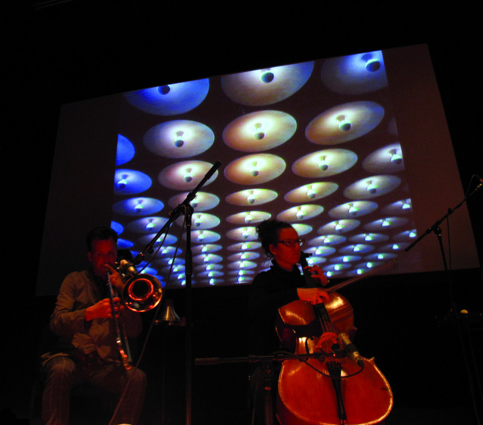 The musicians Scott Thomson and Émilie Girard-Charest of the Ensemble SuperMusique (ESM) during Machinaction [Photograph: Robin Pineda Gould, Montréal (Québec), November 14, 2013]