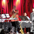 In concert in Montréal, the Ensemble SuperMusique (ESM). Left to right: Scott Thomson; Danielle Palardy Roger; Jean Derome; Martin Tétreault; Joane Hétu; Pierre Tanguay [Photograph: Céline Côté, Montréal (Québec), June 15, 2014]