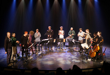 Jean-Luc Guionnet (completely left) and Grand groupe régional d’improvisation libérée (GGRIL) at the end of the concert [Photo: Céline Côté, Montréal (Québec), April 7, 2019]