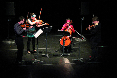 Bozzini Quartet performing the first movement of Le mensonge et l’identité by Jean Derome andJoane Hétu [Photograph: Bruno Massenet, Montréal (Québec), February 21, 2010]