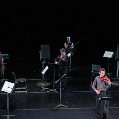 Bozzini Quartet performing the third movement of Le mensonge et l’identité by Jean Derome andJoane Hétu [Photograph: Bruno Massenet, Montréal (Québec), February 21, 2010]