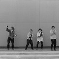 Wondeur Brass (4e formation), portrait style Air Music: Diane Labrosse, Danielle Palardy Roger, Joane Hétu, Gin Bergeron, Hélène Bédard, Judith Gruber-Stitzer [Photograph: Suzanne Girard, 1985]